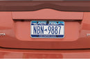 License-plate-mount backup camera with parking lines